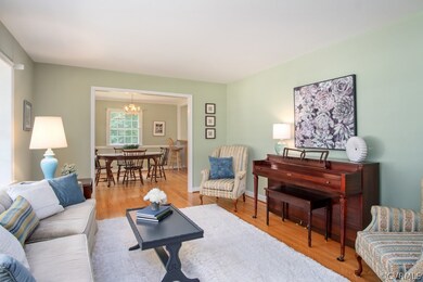 Sun-filled front Living room with large picture wi