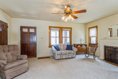 Spacious living room with fireplace.