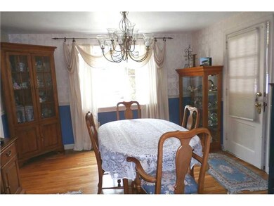Dining Room. LARGE DINING ROOM AREA, WITH VIEW OF THE POOL.  LARGE PORCH OFF DINING ROOM