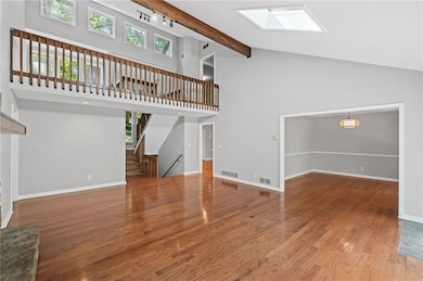 Large spacious high ceilings and wide entry to the dining room continue the spacious open feel