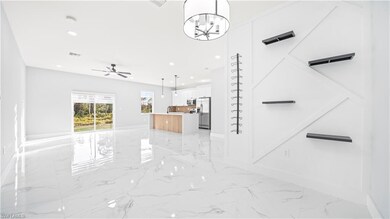 915 Mayfield Ave, Lehigh Acres, FL 33974 - photo 2