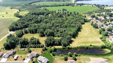 15.3+/- acres bordering development land located off of Hwy 7, East of Silver Lake. Approximately 50 miles West from Minneapolis. Lots of mature trees and a retention pond. Open to any builder.
