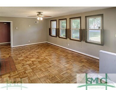 Living Room. Lots of natural lighting throughout t