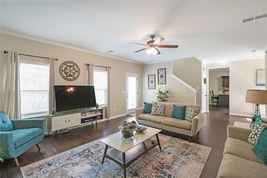 Living room with plenty of natural light, ceiling 