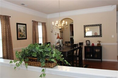 Notice the beautiful hardwood floors in the formal