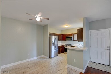 Kitchen with appliances with stainless steel finis