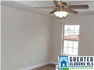 Large Master Bedroom with Ceiling Fan Light Combo 