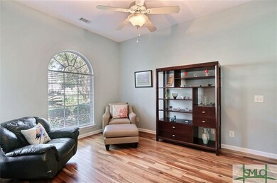 This bright room is flexible and can be used as ad