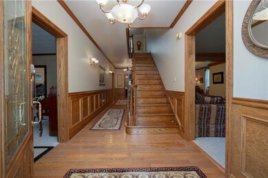 Massive entry foyer with beautiful woodwork!
