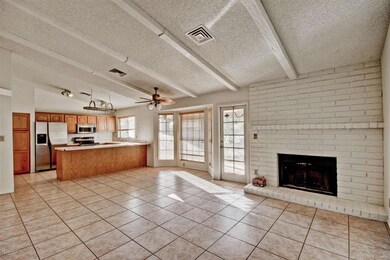 Family Room Opens To Kitchen