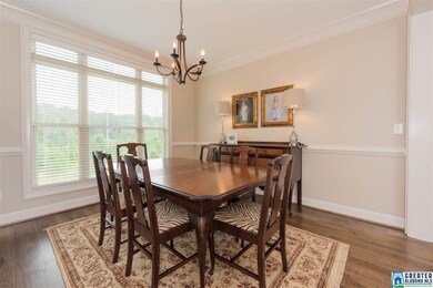 Beautiful dining space with Hickory floors, custom