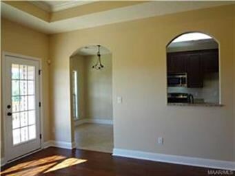 Arch cut outs from great room & kitchen