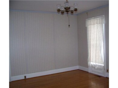Living Room Beautiful hardwood floors and nice siz