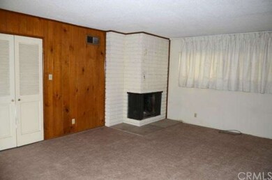 Living room with gas fireplace.