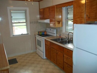 Remodeled kitchen with new appliances.