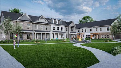Townhomes will surround a courtyard featuring a firepit and cornhole.