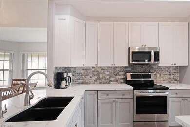 Tile Backsplash gives it a rich look