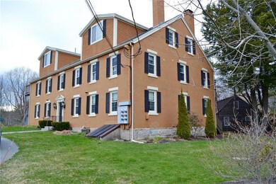 Front of building with 2nd floor...