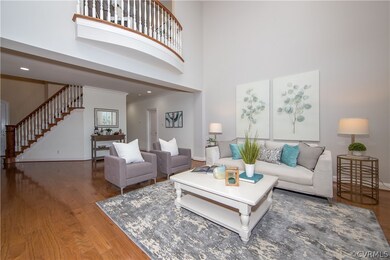 Great Room features a vaulted ceiling, and balcony