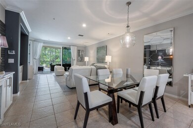 Dining area featuring crown molding, recessed ligh