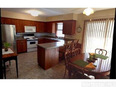 Kitchen/Dining Room. Sliding glass doors lead to t