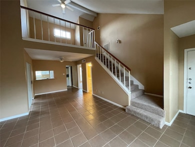 Living room, dining room, and loft upstairs