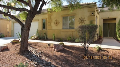 View of front of home featuring an attached garage