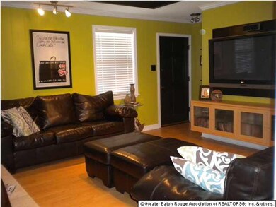 Wood Floors in Living Room and Exposed Beams in Ce