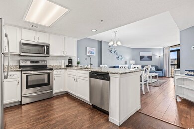 Kitchen featuring sink, appliances with stainless 