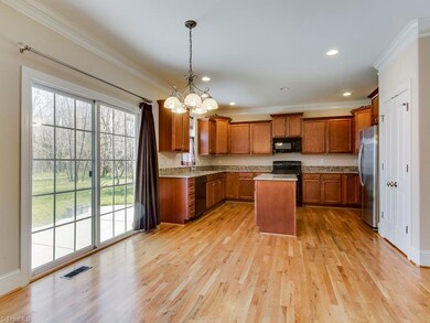 Welcome home to 2497 Kaleigh Way! Gourmet kitchen with granite, pantry, and island.