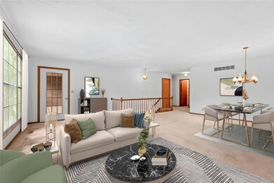 VIRTUALLY STAGED - Great room set up with living and dining areas