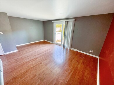 Living room sliding door opens to the patio and ba