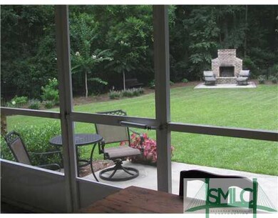 Yard/Garden. View from screened porch to patio and
