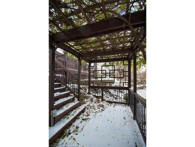 This covered pergola is just one feature of the ba