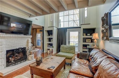 Elegant, light-filled family room has a splendid b