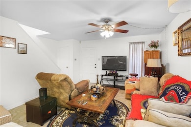 Living Rm toward stairs. All 3 bdrms + 2 full bath