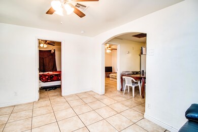 Living Room facing kitchen & Bedroom
