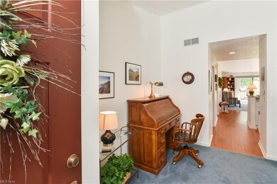The living room opens to the kitchen, dining area and great room.