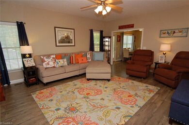 Living room opens to breakfast area and kitchen.