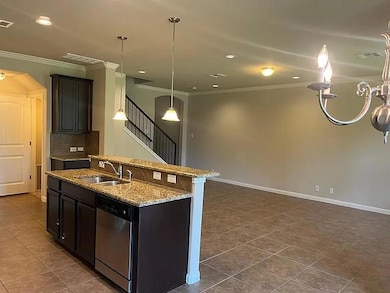 Kitchen featuring a sink, tasteful backsplash, st