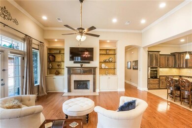 Large living room with 12' ceilings and gas firepl