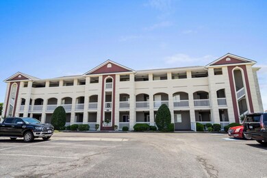 View of building exterior featuring uncovered park