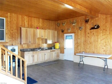 Entry can be used as a summer kitchen
