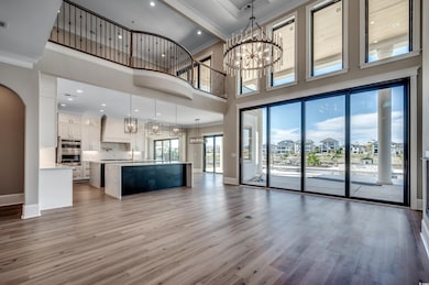 Kitchen featuring ornamental molding, wood finishe