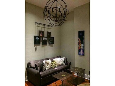 Living Room. High Ceilings add to this tasteful de