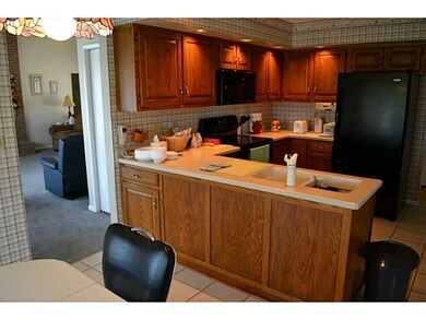 Kitchen. Kitchen opens to sunroom.