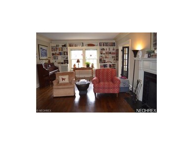 Another view of the living room with a wall of bui