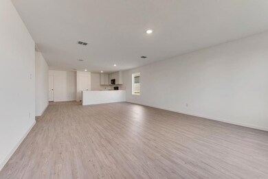Unfurnished living room with light wood-type floor