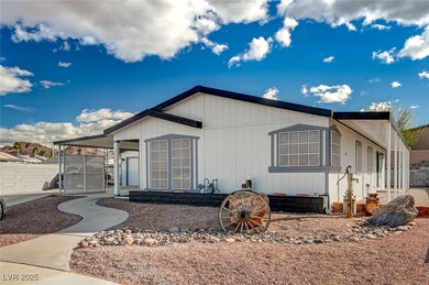View of front of property featuring a carport