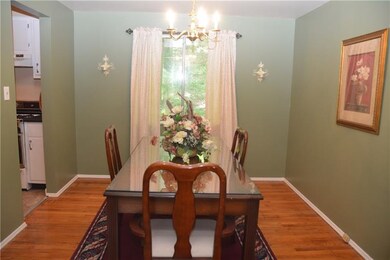 Beautiful hard wood floors continue into the dinin